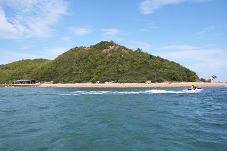 The Island and blue sky with jet skiの写真素材