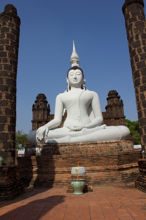 white buddha on clear blue sky backgroundの写真素材