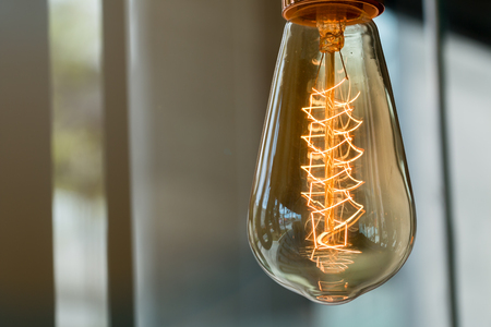 Vintage old lamp in coffee shop, retro lighting lampの写真素材