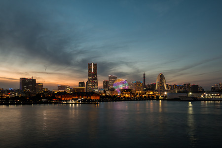 Yokohama Japan - 13 Nov 2016; many photographer are at Yokohama Port in the Sunset to capture the cityscappe lighting by viewing from Osan Bashiのeditorial素材