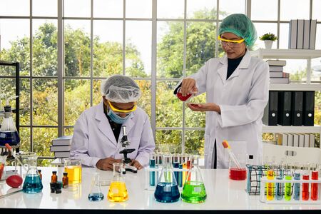 Two scientists research new chemical item in laboratory;
Health care and science technology conceptの写真素材