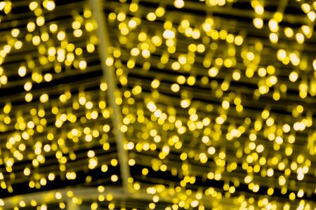Golden Lighting and decoration item for Christmas and New Year Celebration; Blurry Abstract concept