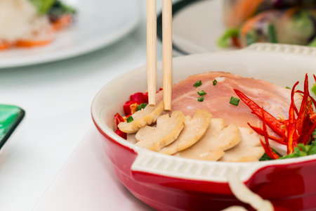 Vietnamese healthy food set; Close up of PHO with sliced pork soup with wooden chopsticksの写真素材