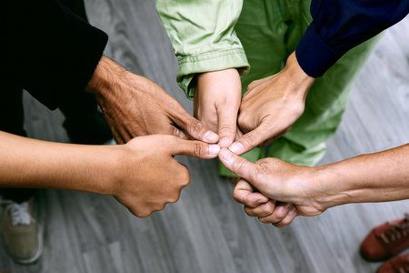 A collaborative team giving thumbs up; Team Approval indicating project approval and success.