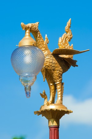 Thai style light pillar on blue skyの写真素材