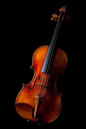 Beautiful vintage violin on black backgroundの写真素材