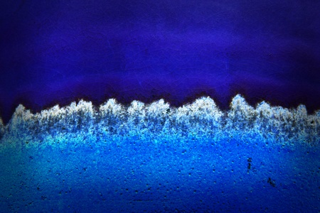 Texture of ceramic surface on dark blue background の写真素材