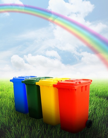 Colorful recycle bins ecology concept with landscape background の写真素材