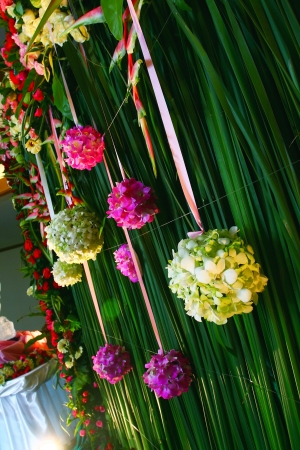 Green backdrop flowers arrangementの写真素材