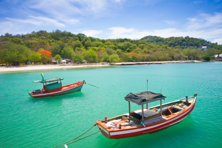 fishing boat on koh si chang beach, Chonburi Thailand の写真素材