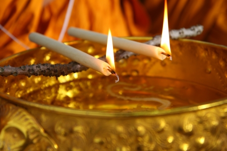holy water, the monks and religious rituals in thai ceremonyの写真素材