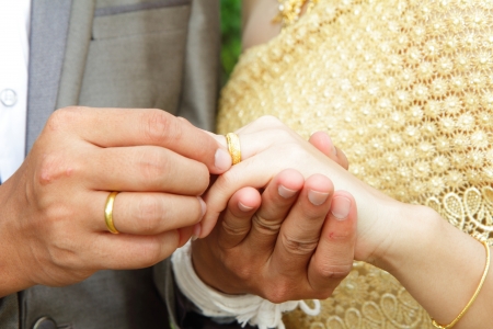 Close up of young male holding woman handの写真素材