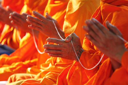 pray, the monks and religious rituals in thai Buddhist ceremony.
