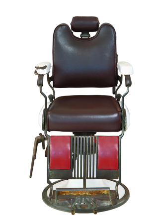 Front view of old barber chair isolated on white background, clipping path.の写真素材