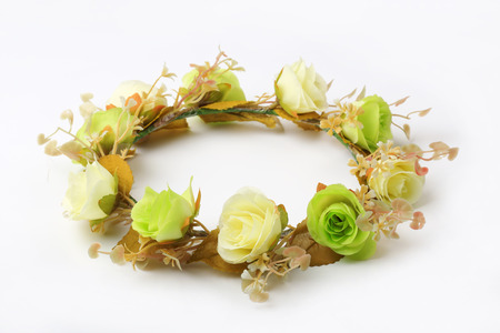 forest coronal or white and green fake flower crown isolated on white backgroundの写真素材