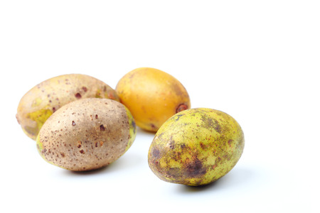 Olive fresh fruit or Spondias pinnata or hog plum fruit on white background.の写真素材