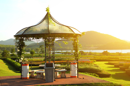 Pavilion in the tropical garden at sunset.の写真素材