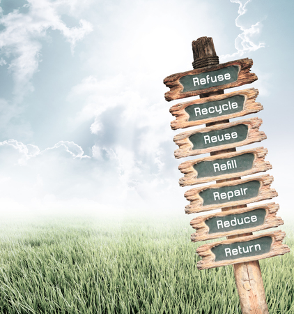 Vintage wooden sign with 7R Refuse, Recycle, Reuse, Refill, Repair, Reduce and Return wording on nature background, ecology concept.の写真素材