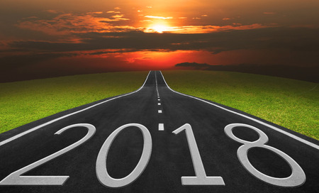 Asphalt road and landscape background with 2018 words, Business concept in 2018.