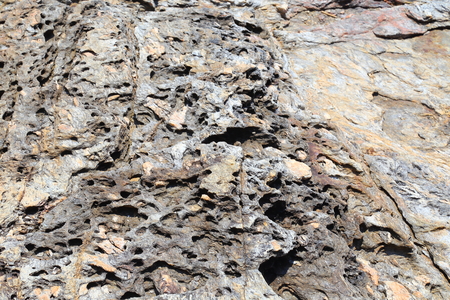 Surface of granite stone textured background.