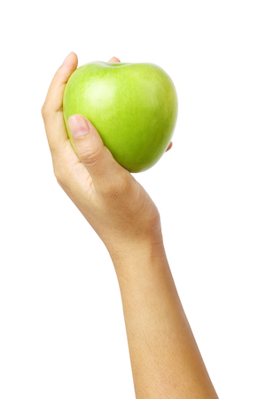 woman hand holding green apple isolated on white backgroundの写真素材