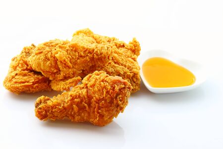 Group of fried chicken with sauce isolated on white background.の写真素材