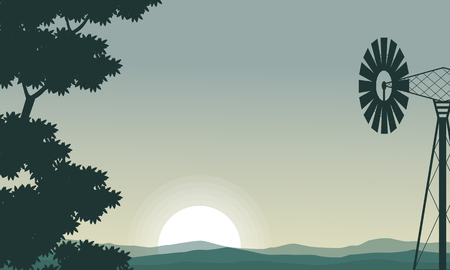Silhouette of windmill and tree on the morning vector illustrationのイラスト素材
