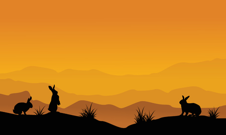 Silhouette of bunny on desert landscapeのイラスト素材