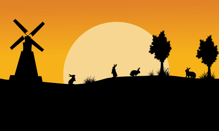 Landscape of bunny and windmill silhouettes vector artの写真素材