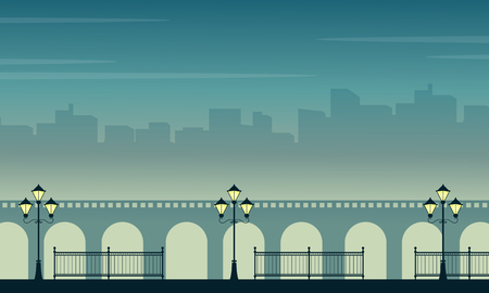 Silhouette of bridge with town scenery at nightのイラスト素材