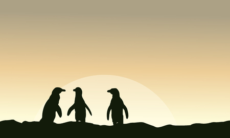 At sunrise scenery with penguin silhouettesのイラスト素材