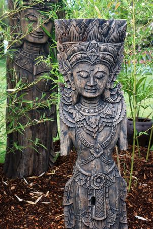 Apsara figures, celestial dancers decorated in gardenの写真素材