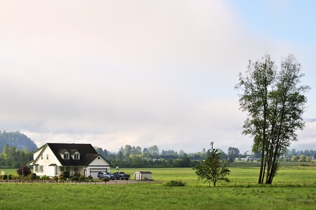 Fraser Valley at foggy sunrise, British Columbia, Canadaの写真素材