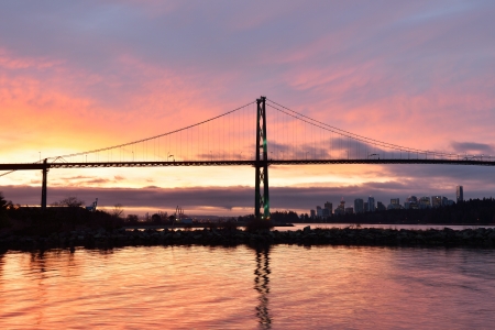 Lions Gate Bridge and Downtown Vancouver at winter sunriseの写真素材