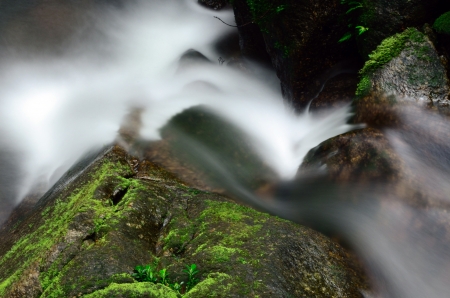 Small Beautiful waterfull on mountain river Thailandの写真素材