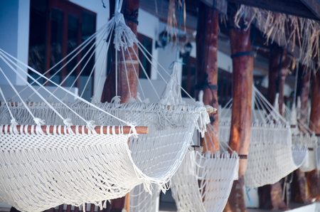 Boutique resort with hammock at the front for relax in the vacation time  at Andaman resort koh lipe,satun,Thailandの写真素材
