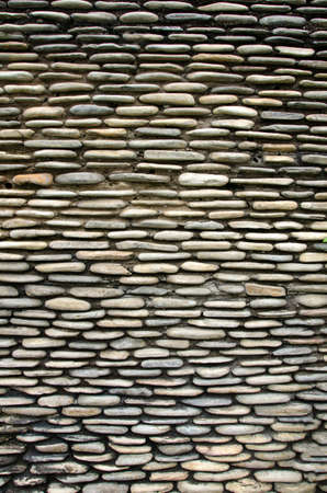 Sea stone background. Stone wall texture or background. Natural stone wall texture for background.の写真素材