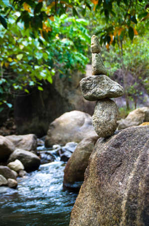 Towers on the river, stone balance zen concept, Thailand.の写真素材