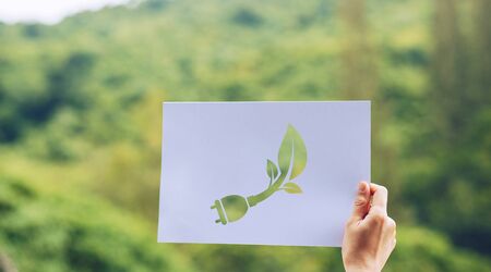 Save world ecology concept environmental conservation with hands holding cut out paper showingの写真素材