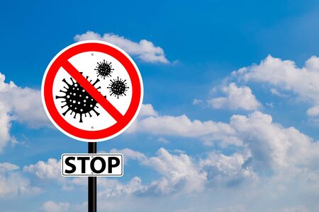 Stop warning sign coronavirus covid 19 in blue sky backgroundの写真素材