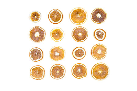 Dried oranges on white isolated background. Flatlay.の写真素材