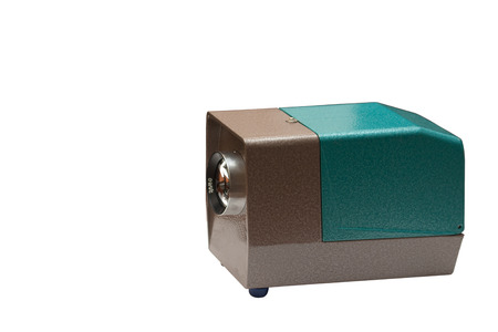 Old green projector isolated on white backgroundの写真素材