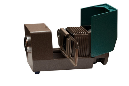 Old green projector isolated on white background. Ready to work.の写真素材