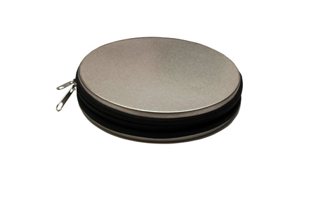 A metal pocket for storing CD discs isolated on white background. To many disks, zip.の写真素材