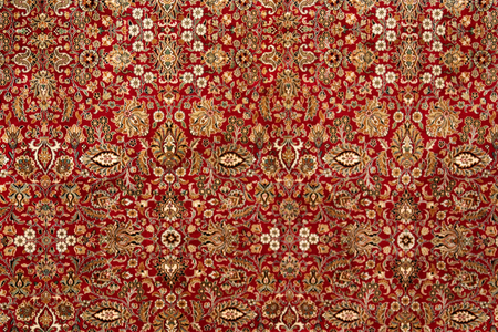 A pattern is a fragment of Eastern wool carpet.の写真素材