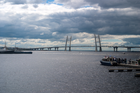 Saint Petersburg, Russia - July 02, 2017: International naval salon. Visitors go on a boat ride to the cable-stayed bridge over Korabelny fairway.のeditorial素材