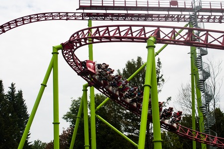 Saint Petersburg, Russia - July 08, 2017: Visitors to the amusement Park and ride on the roller coaster. Divo-Ostrov - rides.のeditorial素材