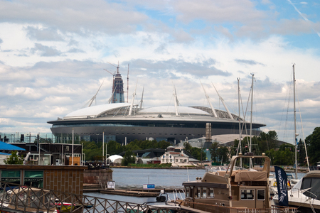 Saint Petersburg, Russia - July 08, 2017: The new football stadium on Krestovsky island and the construction of a skyscraper "Lahta-the centre". In the foreground of the yacht club.のeditorial素材