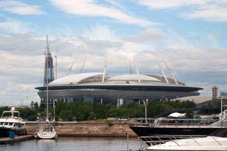 Saint Petersburg, Russia - July 08, 2017: The new football stadium on Krestovsky island and the construction of a skyscraper "Lahta-the centre". In the foreground of the yacht club.のeditorial素材
