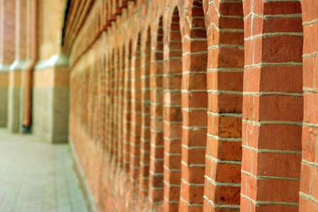 Brick wall with stylized loopholes.の写真素材